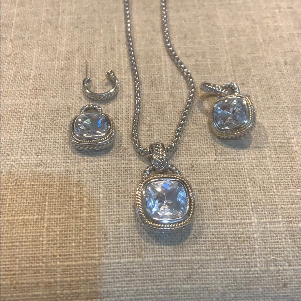 Crystal stone set with silver and gold detail.